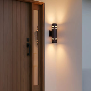 LED sensor wall light mounted near a modern front door, illuminating entryway