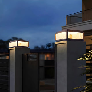 MIRODEMI Solar LED Outdoor Pillar Lights with diamond-patterned glass mounted on gate posts glowing at night