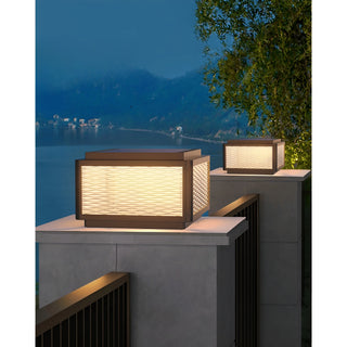 MIRODEMI Solar LED Outdoor Pillar Light with wave-pattern glass illuminating a lakeside terrace