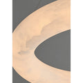 Detailed view of natural Spanish alabaster texture showing its soft translucent surface and warm glow
