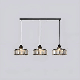 Triple black K9 crystal pendant lights in a linear ceiling bar arrangement for dining space