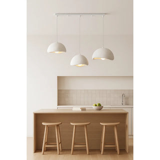 modern kitchen interior with three white curved pendant lamps hanging above a wooden island, minimalist Scandinavian lighting design