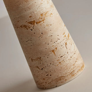 Close-up of MIRODEMI travertine lamp base showing natural stone texture, warm beige tones, and handcrafted surface details