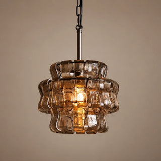Vellori pendant light with a black iron frame and smoke gray glass shade