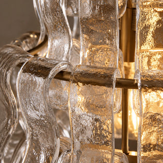 Close-up of Vellori clear textured glass panels and gold frame