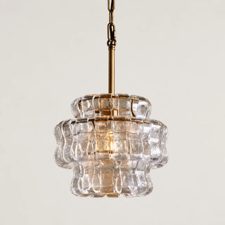 Vellori pendant light with a gold iron frame and clear textured glass panels