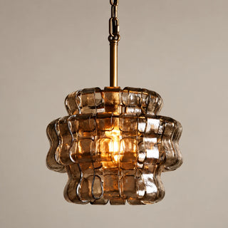 Vellori glass pendant light with a gold iron frame and smoke gray tiered glass shade