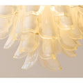 Artistic layered frosted glass panels creating soft luxury lighting effect