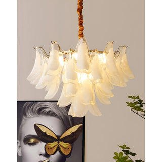 Contemporary Velmira chandelier with sculptural white glass shades and soft ambient illumination