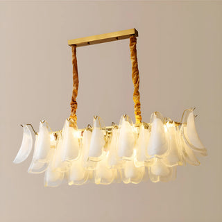 Front perspective of Velmira rectangular chandelier with cascading frosted glass shades and brushed brass frame