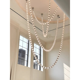 Verona Grand Crystal Staircase Chandelier installed in classic high-ceiling room – K9 crystal chains reflecting daylight