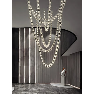 Verona Grand Crystal Staircase Chandelier in modern luxury interior – cascading crystal strands creating sculptural light form