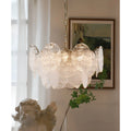 Virella tiered Murano glass chandelier in elegant luxury living room interior with warm decorative lighting