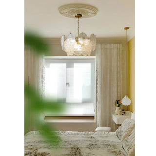 Virella Murano glass chandelier installed in modern luxury bedroom with soft warm decorative lighting
