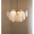 Illuminated Virella Murano glass disc chandelier with handcrafted textured glass and warm glow