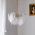 Virella Murano glass chandelier side view with layered translucent glass discs and brass suspension chain