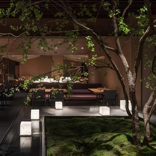 Wabi-sabi inspired interior with marble cube floor lamps - perfect for restaurants, patios, and luxury courtyards