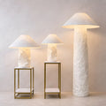 Collection of wabi-sabi paper lamps in different sizes including table lamps and a floor lamp