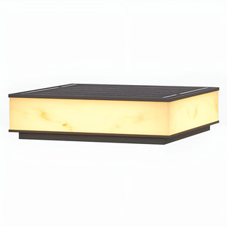 Single marble-finish outdoor solar pillar lamp glowing in warm white light, ideal for garden or villa entrance