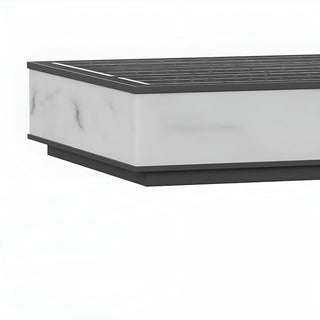 Modern solar pillar light with white marble texture and sleek edges, showing cool white illumination for outdoor use