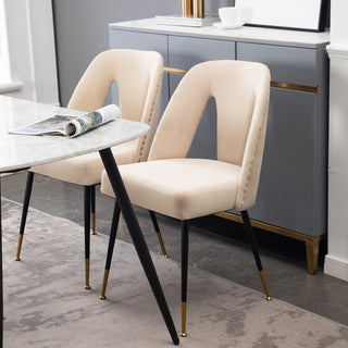 Velvet dining chair upholstered in velvet with black metal legs, minimalist modern