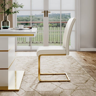White chair in PU leather with gold-tone iron legs, minimalist modern design