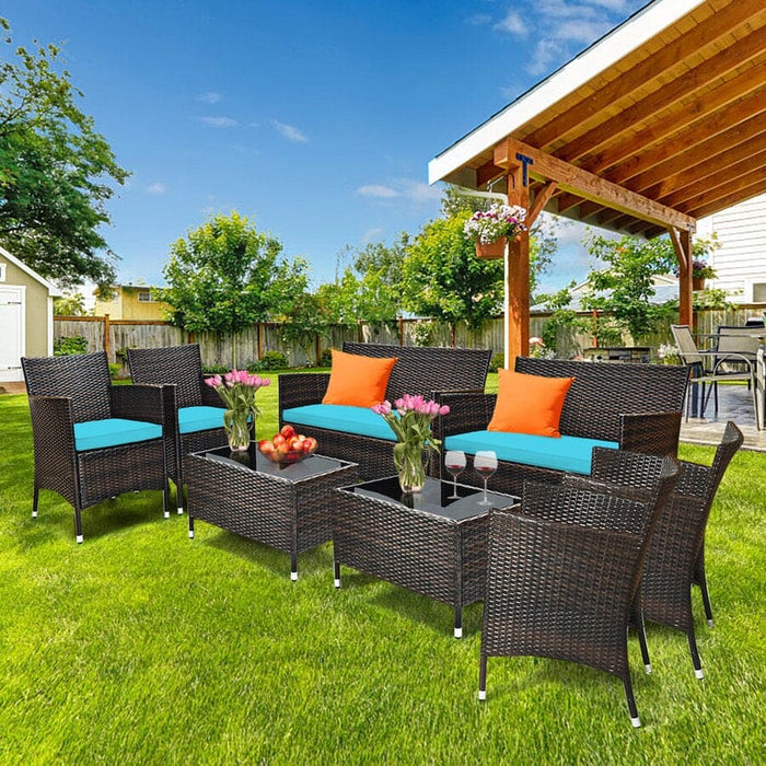 Outdoor Patio Set with Green Cushions and Black Wicker