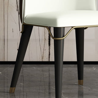 Dining chair made of leather with carbon steel legs, minimalist modern style