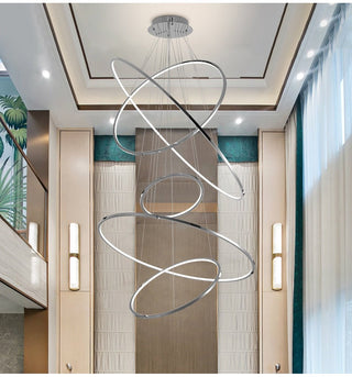 Stainless steel and silicon ring chandelier for a staircase
